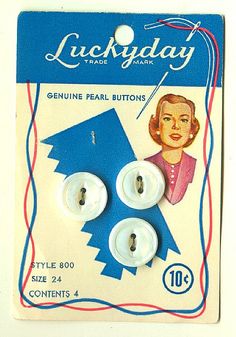 a pair of buttons in the shape of a woman's face