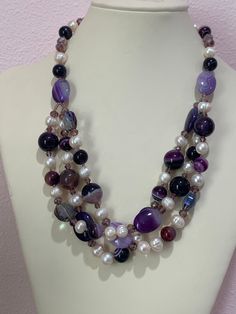 This is a beautiful handmade necklace with genuine agate, natural white fresh water pearls and purple crystals beads, 3 strands drop, finished in one strand, sterling clasp and extender. Spring lobster clasp marked .925. I think the agates has been heat treated for enhancing the color to brighter purple! 21" long. This exquisite piece would look great in anyone's collection. Excellent condition!  PLEASE look at ALL pictures for measurements and condition as they are a very important part of the description, and what you will receive! Pictures are made with different light! Please note that this is sold "As Is", no returns please! The Link to my shop is: https://www.etsy.com/shop/MyWildWork Elegant Purple Agate Beaded Necklaces, Elegant Purple Agate Beaded Necklace, Handmade Purple Pearl Necklaces, Purple Pearl Drop Necklaces, Handmade Purple Pearl Necklace, Purple Beaded Pearl Necklace, Coos Bay, Crystals Necklace, Crystals Beads