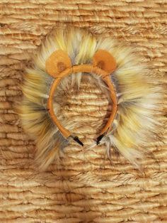 a close up of a furry animal headband