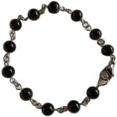 Elegant Black Hypoallergenic Bracelets, Nickel Free Black Beaded Bracelets For Crafting, Hypoallergenic Black Beaded Bracelets, Elegant Black Hypoallergenic Beaded Bracelets, Black Hypoallergenic Beaded Bracelets, Hypoallergenic Black Round Bracelets, Black Stainless Steel Jewelry With Round Beads, Black Rosary Bracelet With 8mm Beads For Jewelry Making, Onyx Bracelets With Polished Beads