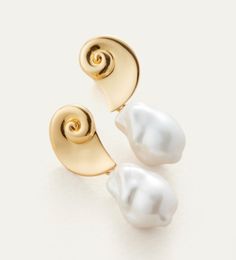 Unleash your inner mermaid with the Jenny Bird Petra Earrings! These silver earrings feature a shell shape and pearl charm, adding a touch of classic elegance to any outfit. With a unique dangle design and high polish finish, these earrings are perfect for those who want to stand out from the crowd. Elegant Shell-shaped Pearl Earrings, Elegant Shell Pearl Earrings For Gift, Elegant Shell-shaped Pearl Earrings For Wedding, Elegant Shell-shaped Jewelry With Pearl Charm, Elegant White Shell Pearl Earrings, Elegant Gold Shell Pearl Earrings, Elegant Silver Shell Earrings, Petra Earrings, Jenny Bird