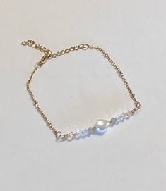 Stylish and delicate bicone swarovski beaded dainty chain bracelet Minimal and elegant gift for her 16 cm long (approx 6,29 inch), plus a 5 cm ext (1,96 inch) Fits a wrist 16-21 cm Should you need smaller or larger size, send me your exact wrist size Bracelet Minimal, Swarovski Beads, Dainty Bracelet, Dainty Chain, Crystal Beads Bracelet, Pearl Crystal, Dainty Bracelets, Swarovski Pearls, Beads Bracelet