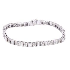 Title Fresh From a Fabulous South Florida Estate! No Reserve, Ever! 18k White Gold Jewelry 4.0CT Diamond Fancy Link Bracelet $3,395.00 PRODUCT DESCRIPTION 18k White Gold Jewelry 4.0CT Diamond Fancy Link Bracelet. This amazing piece of jewelry is crafted in solid 18k white gold and features approx. 4.0CT diamonds (SI1 - SI2 clarity/H - I color). These Baguette/Round cut stones are channel/prong set in a beautifully designed bracelet. This bracelet has a crisp/secure push button slide clasp, with underside safety, for added security and is sure to enthrall anyone who wears it. This piece is in great shape for it's age, has minor scratches from normal wear. Perfect addition to any jewelry collection! Will fit 6.75" wrist Height: 3.3mm Width: 4.3mm Length: 7.25" Primary Stone Grade: SI1 - SI2 White Gold Jewelry, Prong Setting, Gold Jewelry, Jewelry Collection, Stone, Beauty, Color