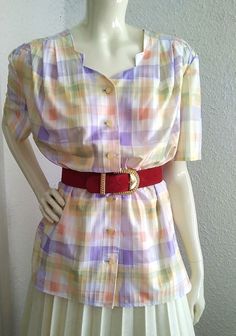 70s pastel blouse, checkered retro blouse, summer rainbow blouse, spring button shirt, statement blous, lilac yellow watercolor print, vacation shirt, polyester, heart shape collar. vintage items always show signs of being worn please check the measurements before ordering Measurements laying flat : shoulders :45 cm (17,5 inches) armpit to armpit :57 cm (22,5 inches) total lenght :65 cm (25,5 inches) sleeve lenght :25 cm (9.5 inches) Summer Plaid Blouse For Daywear, Summer Purple Shirt For Daywear, Summer Daywear Purple Shirt, Summer Plaid Button-up Blouse, Summer Plaid Short Sleeve Blouse, Plaid Short Sleeve Summer Blouse, Summer Plaid Blouse With Short Sleeves, Retro Plaid Shirt For Summer, Summer Vintage Purple Shirt