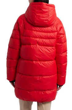 Plush teddy faux fur insulates and comforts a lightweight puffer jacket designed to look chic through rough and wintry weather. 33" length Water repellent Front zip closure with storm placket Fixed hood with drawcord and toggle Inner shoulder straps Polyester faux fur lining 100% nylon Machine wash, tumble dry Imported Red Winter Puffer Jacket With Zipper, Hooded Red Down Outerwear, Red Hooded Down Outerwear, Red Nylon Outerwear For Cold Weather, Red Hooded Down Puffer Jacket, Outdoor Down Puffer Jacket With Faux Fur Trim, Red Nylon Puffer Outerwear, Red Nylon Puffer Jacket For Cold Weather, Casual Red Down Puffer Jacket