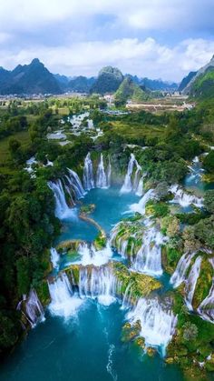 an aerial view of waterfalls in the water