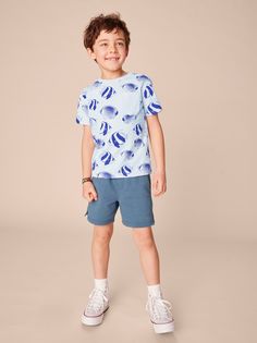 This school of fish is too cool for school--making it the perfect summertime tee. (Fun angelfish fact: Their scientific name means "covered in thorns" since they have a hard, spiny growth for protection.) A customer favorite, our Pocket Tee is a great vacation top paired with chinos or shorts. Crafted from 100% soft cotton jersey. Playful Summer T-shirt For School, Cotton T-shirt With Shark Design For Summer, Casual Blue Tops With Fish Print, Cotton T-shirt For Summer Ocean Activities, Summer Cotton T-shirt For Ocean Activities, Blue Fish Print Top For Summer, Summer Short Sleeve T-shirt With Shark Design, Casual Summer T-shirt With Shark Design, Summer Crew Neck T-shirt With Fish Print