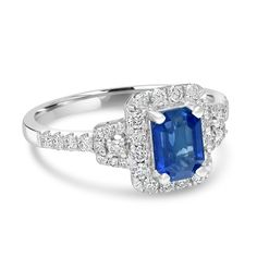 Blue Square Cut Diamond Ring, Blue Diamond Ring With Square Cut, Emerald Cut Sapphire Diamond Ring In Platinum, Classic Blue Radiant Cut Emerald Ring, Classic Blue Square Cut Diamond Ring, Blue Emerald Cut Diamond Ring With Halo Setting, Fine Jewelry Blue Square Cut Diamond Ring, Formal Blue Emerald Cut Halo Ring, Blue Platinum Rings With Square Cut