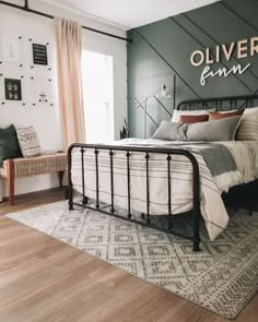 a bed room with a neatly made bed next to a wooden floor and a chair