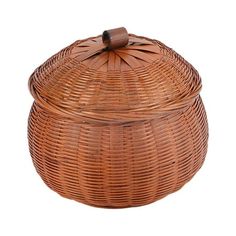 a brown wicker basket on a white background