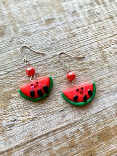 Handmade watermelon Earrings! Nickel free posts. Measures 1.75 inches long. 🍉 🍉 🍉 🍉 🍉 🍉 🍉 🍉 🍉 Jewelry Care: to keep your jewelry in optimal condition avoid dropping them on a hard surface as this can cause chips or fractures of the polymer clay. Keep your jewelry in a dry box or container when not in use. Avoid direct contact of perfumes, lotions or cosmetics while wearing your jewelry. Playful Nickel-free Dangle Jewelry, Kawaii Dangle Earrings With Ear Wire, Fun Green Fruit Design Earrings, Green Fruit Design Fun Earrings, Green Dangle Earrings With Fruit Design, Adjustable Kawaii Dangle Earrings, Green Drop Earrings With Fruit Design, Playful Hypoallergenic Dangle Jewelry, Green Handmade Fun Earrings