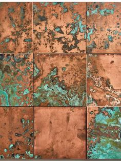 an old rusty metal plate with blue and green paint on it's surface photo