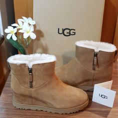 New In Box! A Soft Water-Resistant Suede Upper And A Wrapped Hidden Wedge Offer A Chic And Versatile Style When You Step Out In The Ugg Classic Femme Zip Mini Ankle Boot. 10mm Sheepskin Lining Uggplush 80% Wool, 20% Lyocell Insole Poron Footbed Treadlite By Ugg Outsole For Comfort Hidden Wedge Heel Leather Heel Label With Embossed Ugg Logo Inside Zipper Rear Pull Tab Color: Chestnut Note: Inside Shoe Tag And/Or Box Marked With Red Marker To Avoid Store Returns. Price Is Firm! (B3) Short Brown Boots, Ugg Classic Tall, Ugg Classic Ultra Mini, Black Uggs, Inside Shoes, Brown Leather Ankle Boots, Black Suede Booties, Shearling Boots, Sheepskin Boots