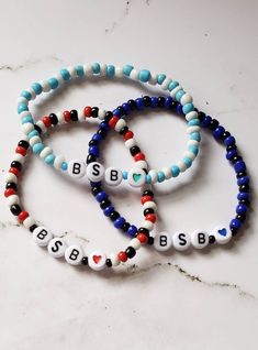 Backstreet Boys Bracelets make the perfect accessory to complete your concert outfit! Compliment your concert shirt with one or more of these great bracelets. Looking for a gift for your best friend who also happens to be a backstreet boy fan? These bracelets make a great gift! You can choose from 3 different designs that go with their best albums! Each bracelet is made with colorful seed beads and plastic letters in the center.   The bracelets are made to size.  If you need a size other than th Boys Bracelet, Boy Party Decorations, Backstreet Boy, Boys Bracelets, Plastic Letters, Best Albums, Concert Shirts, 90s Nostalgia, Backstreet Boys