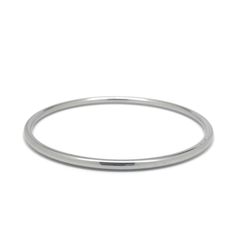 Adorn your wrist with these stylish, silver stainless steel bangles (3mm). Perfectly versatile, they'll never tarnish and can withstand any nicks or scratches. Plus, stainless steel is hypoallergenic, making it a great option for those with sensitive skin (no more green marks!). Choose from an 8 inch or 9 inch bangle, and don't forget to measure for the perfect fit (a string and ruler should do the trick!). And the cherry on top? Your bangles will arrive in a cute satin pouch, ready for gifting Minimalist Round Stainless Steel Bracelets, Silver Stainless Steel Bangle With Polished Finish, Minimalist Silver Stainless Steel Bangle, Modern Stainless Steel Round Bangle, Everyday Metal Bangle, Modern Stainless Steel Bangle For Everyday, Classic Nickel-free Round Bangle, Silver Hoop Bracelets For Everyday, Minimalist Stainless Steel Bangle For Everyday