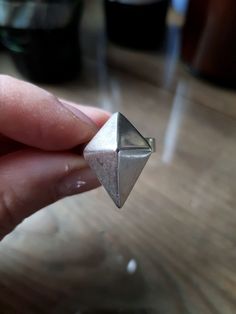 A very nice, Polish ring in pyramid shape. It was made in Warsaw (letter W next to the profile of a woman in a kerchief, which means the origin of the construction W-Warsaw).  The woman is looking to the right, so the product was made after 1983.  Hallmark 925 and the second, sign of the maker's marks. In good used vintage condition, silver has not been cleaned. This lovely retro ring comes from my private collection. Dimensions approx: The dimensions of the decorative element are approx. 2 cm x Pyramid Shape, Retro Ring, Warsaw Poland, Forest Design, Cardboard Tube, No 8, Ring Band, Original Gift, Vintage Vibes