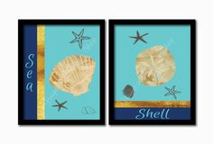 two framed pictures with shells and starfishs on them, one is blue and the other is gold