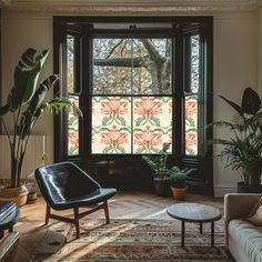 a living room filled with furniture next to a large window covered in plants and potted plants