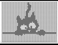 a cross stitch pattern with a black and white cat on the front, in grey and white