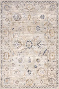 an area rug with various colors and designs on the carpet, including blue, beige, grey