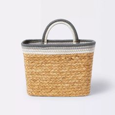 an image of a basket with handles on the handle and two tone trimmings