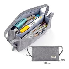 an image of a purse with pens and pencils in it on the side, next to a ruler