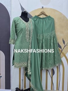 Fabric Details :- TOP :- Top Fabric : Heavy Faux Georgette And Full Sleeve With Work Top Work : Heavy Fancy Embroidery And 5 mm Sequins Work With Latkan Lace Work (Only Front Side Work) Top Inner : Micro Cotton Top Length : 32-34 Inch Top Size : 42 XL (Full Stitched) XXL Margin SHARARA :- Sharara Fabric : Heavy Faux Georgette Sharara Work : Heavy Fancy Embroidery And 5 mm Sequins Work Sharara Inner : Micro Cotton Sharara Length : 40-41 Inch (Fully Stitched) Up To XXL DUPATTA :- Dupatta Fabric : Fitted Green Chinon Sets, Fitted Georgette Sets With Zari Work, Fitted Pista Green Traditional Wear With Mirror Work, Fitted Pista Green Dress With Mirror Work, Pista Green Summer Party Sets, Summer Party Sets In Pista Green, Fitted Pista Green Salwar Kameez With Mirror Work, Fitted Georgette Sets For Diwali, Pista Green Chinon Sharara For Party