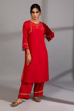 Red kurta with zardozi, sequin placement embroidery. Paired with straight fit pant and dupatta.
Components: 3
Pattern: Embroidery
Type Of Work: Zardozi, sequin
Neckline: Keyhole
Sleeve Type: Three quarter
Fabric: Chanderi Mul, Cotton Silk
Color: Red
Other Details: 
Lace embellished pant hem
Length:
Kurta: 45 inches
Pant: 37 inches
Dupatta: 2.4 mtrs
Occasion: Sangeet - Aza Fashions Embroidery Zardozi, Placement Embroidery, Red Kurta, Vibrant Outfits, Kurta Set For Women, Straight Fit Pants, Pattern Embroidery, Kurta Set, Pant Set