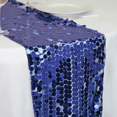 Quantity: 1 Table Runner Fabric: Big Sequin On Mesh Base Color: Navy Blue Sequin Size: 18Mm Total Length: 108" Total Width: 13" Works Beautifully With Our Tablecloths Seamless, 1Pc Design.  Additional Information: Material: Big Sequin On Mesh Base Sequin Size: 18Mm Total Length: 108" Total Width: 13" Care Instructions: Do Not Dry Clean Or Machine Wash. Wipe With A Soft Damp Cloth Uses: Make Your Tables More Dazzling That Can Be Used In Hotel, Restaurants For Holiday Celebration, Bridal And Baby Shower, Wedding, Buffets, Dessert Tables, Catered Events, Reunions, Workshops, Anniversaries, Corporate Events. - 13"x108" Navy Big Payette Sequin Table Runner | By Tableclothsfactory Navy Blue Wedding Decorations, Banquet Table Decorations, Restaurant Table Tops, Blue Wedding Decorations, Sequin Table Runner, Head Tables, Sequin Table, Table Overlays, Bridal Table