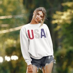 Celebrate the United States Of America with this patriotic USA sweatshirt or give it as the perfect gift! A Gildan Unisex Heavy Blend™ Crewneck Sweatshirt and excellent quality print make this one to fall in love with it over and over again. Our garments are printed using the latest DTG (Direct to Garment) technology. This is not an iron-on or a cheaply printed image, but the best quality print you'll find anywhere! All of our items are individually custom printed to ensure that you receive the Patriotic White Cotton Sweatshirt, Patriotic Letter Print Sweatshirt For Independence Day, White Long Sleeve Tops For Independence Day, Independence Day Cotton Sweatshirt With Letter Print, Independence Day Cotton Letter Print Sweatshirt, Patriotic Cotton Sweatshirt With American Flag Print, Patriotic Crew Neck Sweatshirt For Independence Day, Patriotic Long Sleeve Sweatshirt For Independence Day, Casual 4th Of July Sweatshirt With Letter Print