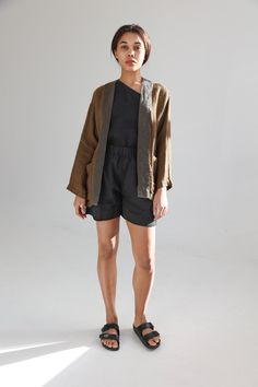 "Linen kimono-style blazer with two patch side pockets. Dropped shoulders and relaxed sleeves make this cardigan democratic for various body types. It goes well with tapered and palazzo pants or even shorts. Great for warm summer evenings. This linen jacket is crafted from exclusive jacquard linen. Its delicate and luxurious lace pattern reminds hand knitted cardigans. The fabric has a really chic look that makes this blazer a perfect pick not only for casual but also more formal occasions. Doub Linen Cardigan For Layering In Fall, Brown Relaxed Fit Outerwear For Summer, Fall Linen Cardigan For Layering, Casual Linen Kimono For Loungewear, Summer Linen Long Sleeve Outerwear, Summer Linen Long Sleeve Blazer, Long Sleeve Linen Blazer For Summer, Linen Cardigan For Workwear In Fall, Fall Workwear Linen Cardigan