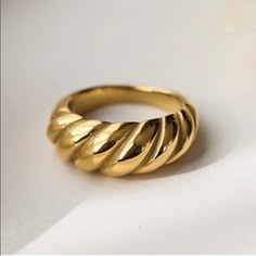 Brand New Size 6,7,8,9 Elegant Dress Up Or Down Perfect To Wear Alone Or Stacked, This Gold Twisted Ring Is The Ultimate Addition To Your Ring Collection. With An Original Design, Handcrafted In Stainless Steel, And A Thick 14k Gold Layer, This Gold Twist Ring Spells Fabulous. It Looks Gorgeous On Its Own, But You Can Also Stack It With Other Interesting Rings For An Edgy Look. Chunky Gold Ring With An Artisan Feel Polished Texture & Dipped In 14k Gold Not Stamped Thick Band Ring, Thick Gold Ring, Croissant Ring, Stackable Ring Sets, Rope Rings, Thick Ring, Gold Rings Stackable, Zierlicher Ring, Bold Rings