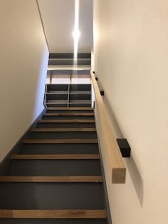 the stairs are made of wood and metal