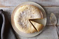 a cake on a plate with one slice cut out