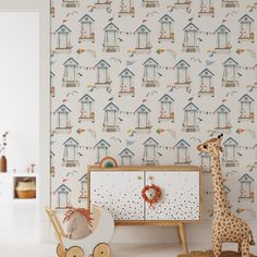 a child's room with a giraffe wallpaper and wooden toy cars