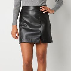 Add a bit of edge to your sleek look with this women's faux leather mini skirt from Worthington. Cut to a mid-rise it has a smooth waistband with a concealed side zip closure and a side slit. Versatile for many looks, pair it with a satin blouse and stilettos or a t-shirt and ankle boots.Front Style: Flat FrontClosure Type: Side ZipperClosure Location: Left SideRise: Mid RiseApparel Length: 18 InchesFiber Content: 100% PolyesterFabric Description: Faux LeatherLining: Fully LinedLining Material: Lace Pants Outfit, Petite Skirts, Tall Skirt, Mini Skirt Black, Lace Pants, Faux Leather Mini Skirt, Petite Skirt, Leather Mini Skirt, Wardrobe Inspiration