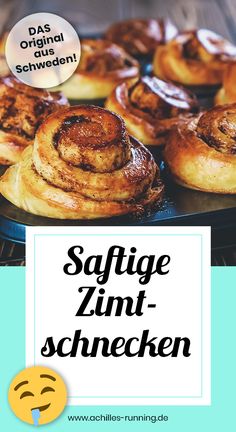 some cinnamon buns are on a plate with the words saffge zimt - schnecken