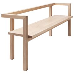 a wooden bench sitting on top of a white floor