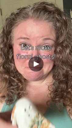 a woman with curly hair holding a stuffed animal in front of her face and the words let's make floral ghosts