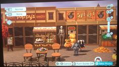 an animated image of a store front with pumpkins on the tables and chairs around it