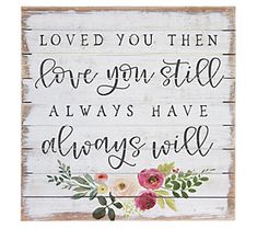 a wooden sign with flowers on it that says, loved you then love you still always have