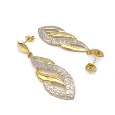 These two-tone fancy hanging design hoop earrings are available in 10k gold. Metal: 10k GoldType: EarringsSize: 0.5" x 1.65"Clasp: Push Back Dual-tone Gold Drop Earrings, Gold Dual-tone Earrings For Formal Occasions, Elegant Gold Dual-tone Earrings, Elegant Dual-tone Gold Earrings, Gold 14k Diamond Earrings With Elegant Design, Elegant Yellow Gold Dual-tone Earrings, Elegant Dual-tone Yellow Gold Earrings, Elegant Dual-tone Drop Earrings, Elegant Dual-tone Dangle Jewelry