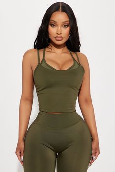 Available In Black And Olive. Active Top V Neck Sleeveless Elevate Mesh Panel Detail Racerback Medium Impact Pair With "Claudia Elevate Active Legging" Self 1 73% Polyester 27% Spandex Self 2 82% Nylon 18% Spandex Inner Mesh 82% Nylon 18% Spandex Imported | Carmen Elevate Active Top in Olive Green size Medium by Fashion Nova Olive Fashion, Active Top, Service Women, Active Leggings, Mesh Panel, Black Beauty, Matching Dresses, Sport Fashion, Top Tee