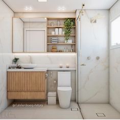 a bathroom with a toilet, sink and shelves in the wall next to each other