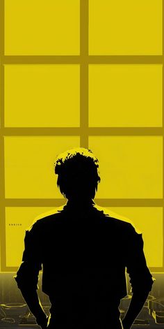 the silhouette of a person standing in front of a window with yellow squares on it