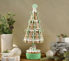 a christmas tree made out of cookies on a table