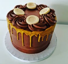 a chocolate cake with banana slices on top