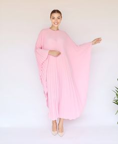 "A special collection with pleated kaftan in fan-style will bring the best \"new\" look for any occasions you may attend. Classic but chic !. It's totally smoothly flowy, soft and gentle touch. FEATURES - Light Pink  - Pleated - Personal Custom Made - Full Length Kaftan  - Designer Silk Kaftan - Plus Size and Custom Length - Resort Wear, Beach Wear, Lounge Wear, Pool Cover Up Kaftan - Boat Neck -------------------------------- DETAIL  * The maximum length : 134 CM ( please be noted, this can not Pink Pleated Vacation Dress, Long Pink Kaftan For Party, Pink Long Kaftan For Party, Pink Pleated Beach Dress, Pink Pleated Maxi Dress For Vacation, Oversized Pink Maxi Dresses, Elegant Pink Kaftan For Beach Cover-up, Pink Maxi Kaftan For Parties, Pink Long Dress For Loungewear