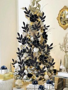 a decorated christmas tree with black and white decorations