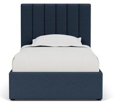 a bed with a blue headboard and white sheets on it's sides, in front of a white background